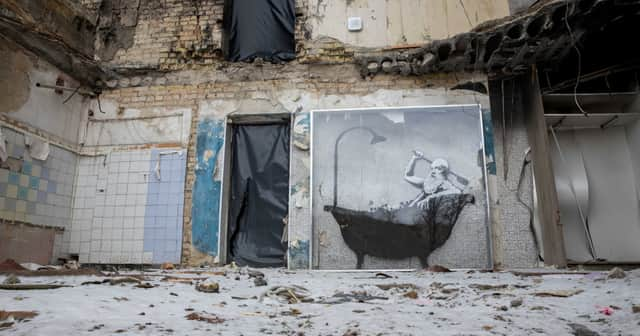 ukraine-banksy-murals-are-constantly-guarded-in-war-torn-cities-as-thieves-try-to-steal-the-art