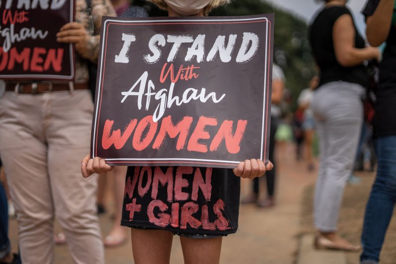 the-start-of-international-women’s-day-is-marked-by-a-group-hug