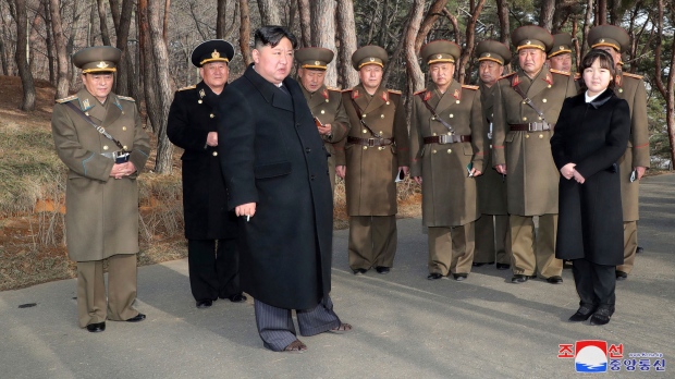 kim-directs-north-korean-soldiers-as-they-practice-an-assault-on-the-south